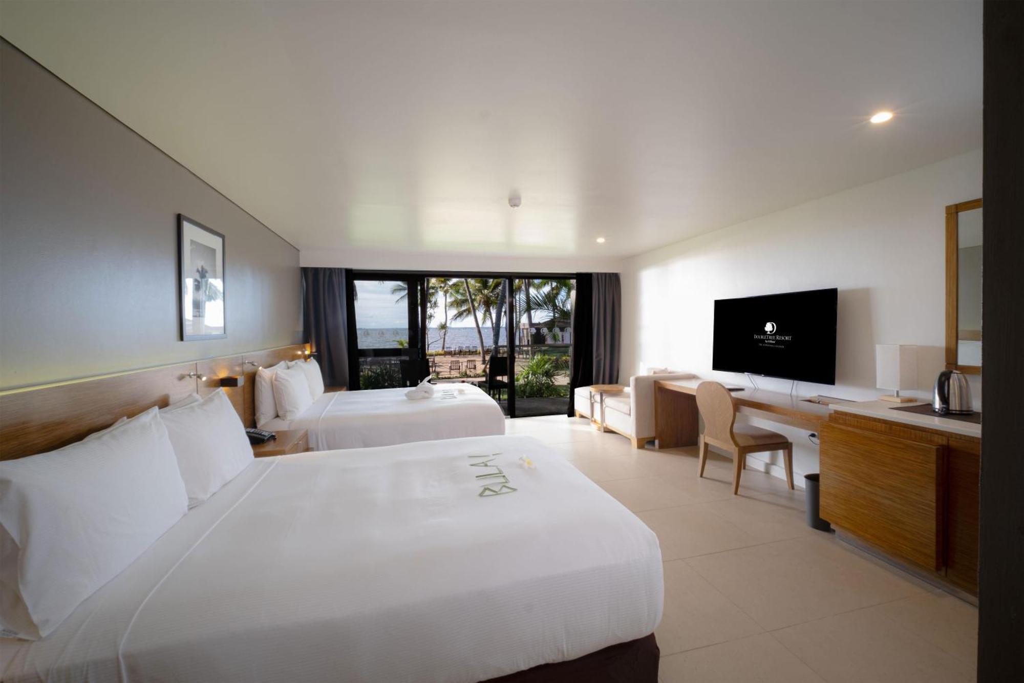 Double Queen Guest Room Beachfront Balcony